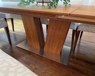 9' 9" long dining table (without 39" leaf, measures 6' 7") with 10 chairs  