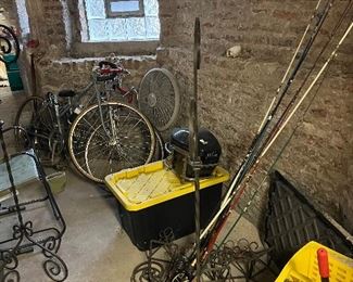 Fishing poles and mop bucket 