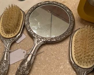 Antique mirror and brush