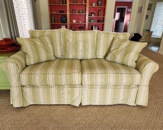 Slipcover sofa with down pillows