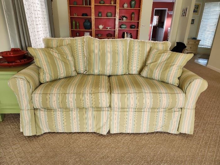 Slipcover sofa with down pillows