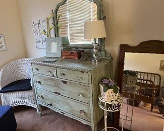 Antique painted dresser with mirror.  wicker chair