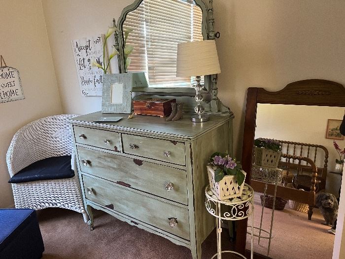 Antique painted dresser with mirror.  wicker chair