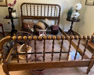 Antique spool full size bed frame. Baskets