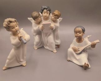 Lladro Angel with Flute (left) Lladro Group of Angels (middle) Lladro Angel Boy Playing Mandolin (right)
**ALL with original boxes