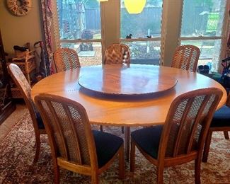 ONE OF A KIND
Dining table with added lazy susan. The top lazy susan was added and is made of rosewood and is approx 41" which is also laying on top of another lazy susan base made of cocobolo wood that actually goes with the original marble top table below the large round birch plywood= actual table