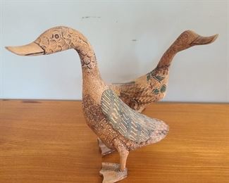 Wooden etched in paint ducks