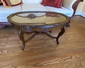 #20	eagle carved in wood of glass protected coffee table 38x21x18	 $175.00 			
