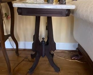 #22	Eastlake end table with marble top 15x20x27	 $125.00 			
