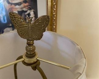 #24	brass heavy lamp with shade and butterfly finial  32 tall 	 $100.00 			
