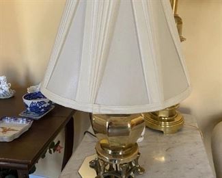 #25	short brass lamp 19 tall with shade 	 $75.00 			
