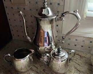 #39	Oneida silverplate tea pot and Rogers sugar and creamer 	 $30.00 			
