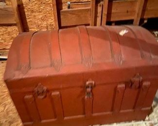 #32	red painted camel back chest with tray 	 $75.00 			
