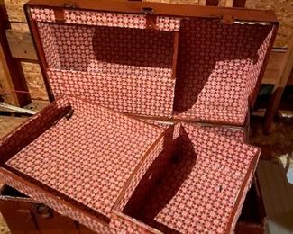 #32	red painted camel back chest with tray 	 $75.00 			
