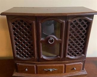 #37	small jewelry cabinet 2 doors and 9 drawers 14x7x13	 $25.00 			
