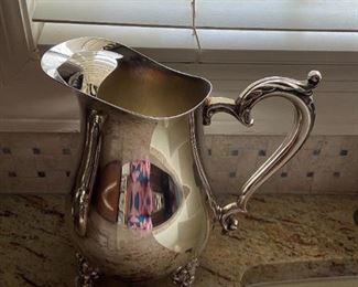 #40	misc.	Oneida silverplate water pitcher	 $20.00 			
