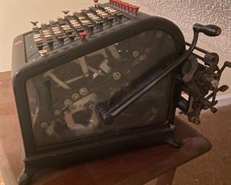 #56	LM	antique adding machine by Burroughs  Detroit Mich. 	as is side glass broken  $30.00 			
