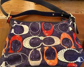 #60	Purses	Coach Legacy Heritage Signature Shoulder Bag	 $75.00 			
