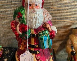 #71	C Radko	Christopher Radko VTG. Ruby Santa	 $40.00 			
