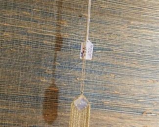#87	Jewelry	Kendra Scott gold and mother of pearl necklace 	 $40.00 			
