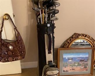 #100	misc	vintage golf clubs in a bag 	 $24.00 			
