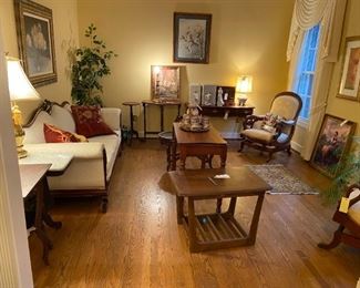 #57	mid centrury end table 30x21x20	 $45.00    #4		maple game table 36x18-36x28	 $125.00 			
#21	sofa	eagle carved on back of white antique palor sofa 87 inches long 	 $125.00 			
#16	chair	yellow swain neck arm rocker 	 $100.00 			
#17	chair	yellow curved arm antique rocker 	 $100.00 			
