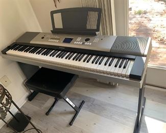 Yamaha YPG-525 Piano with Bench - $ 120.00 (Display needs repair) Piano does play.