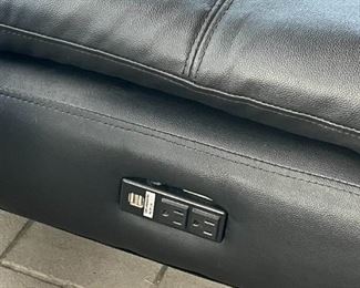 Convertible Sleeper Sofa by Serta. Includes two 120V power outlets and 2 USB ports for charging personal electronics.