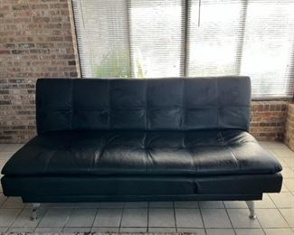 Convertible Sleeper Sofa by Serta. Includes two 120V power outlets and 2 USB ports for charging personal electronics. 75" x 47"