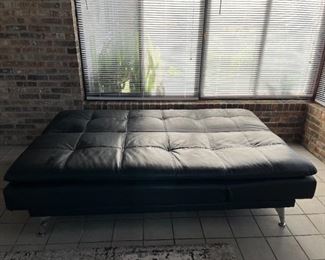 Convertible Sleeper Sofa by Serta. Includes two 120V power outlets and 2 USB ports for charging personal electronics.