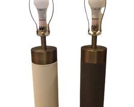 $140 USD      Set of Two Harlow Shagreen Cylinder Table Lamps 1 Ivory Grey & 1 White VR49-10875     Description : Boasting a fabric drum shade atop a column base with a faux shagreen facade, the Harlow radiates sophistication. This Regina Andrew original is an example of craftsmanship that beautifies while it illuminates.

Item Number : 49-10875

Category : Table Lamps

Brand : None

Attributes

Condition Desc. : These lamps are in like new condition. There are only MINOR superficial signs of wear. Please refer to photos for a more detailed look at condition. We make every attempt to list and photograph any defects or signs of wear that are significant to this sale.
Location : Portland, OR     https://goodbyhello.com/products/set-of-two-harlow-shagreen-cylinder-table-lamps-1-ivory-grey-1-white?_pos=13&_sid=cbcb4d97a&_ss=r