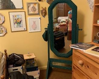 Wicker mirror poised for a repaint