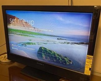 Dynex 32 inch TV with remote and stand (shown with Chromecast attached (not included)