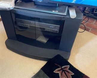 . . . VCR player and TV stand