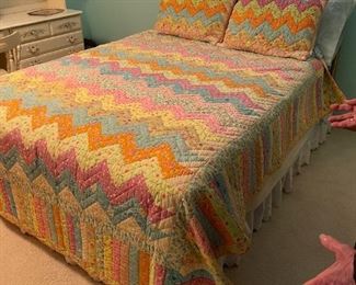 . . . great quilt on brass bed