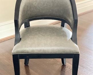 Sylvie Ebonized Wood Lounge Chair Upholstered in Grey Faux Shagreen Leather. Measures 22" W x 24" D. Photo 1 of 3. 