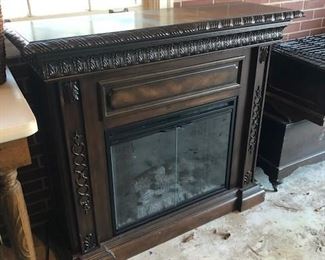 Beautiful infrared electric fireplace with flames and heat