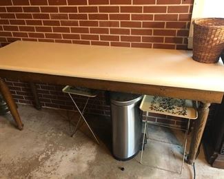 cutom made bar, table with corian top and vintage base, trash can, tv trays