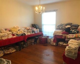 all kinds of linens, sheets, afghans, towels, comforter sets, vintage baby stuff, dog outfits, comforter sets, silk drapes