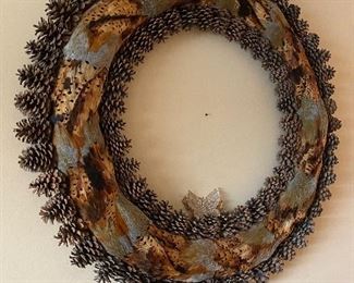 Pheasant feather and pine cone wreath