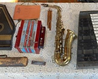 musical instruments - mandolin, accordion, saxophone; glockenspiel & a steam whistle
