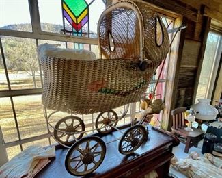 vintage wicker doll buggy