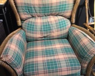 Plaid rattan recliner.