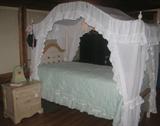 White washed twin pine canopy bed