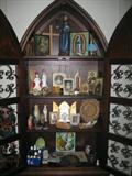 Cabinet with Religious Memrobilia