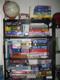 A shelf full of vintage & new games