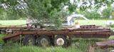 3 AXEL FLAT BED DOVE TAIL TRAILER