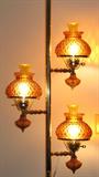 Close up of Fenton Amber Pole Lamp