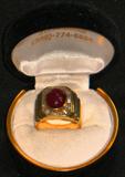 Cabochon Ruby surrounded by Emerald Cut Baget Diamonds (750)18K Gold Man's Ring