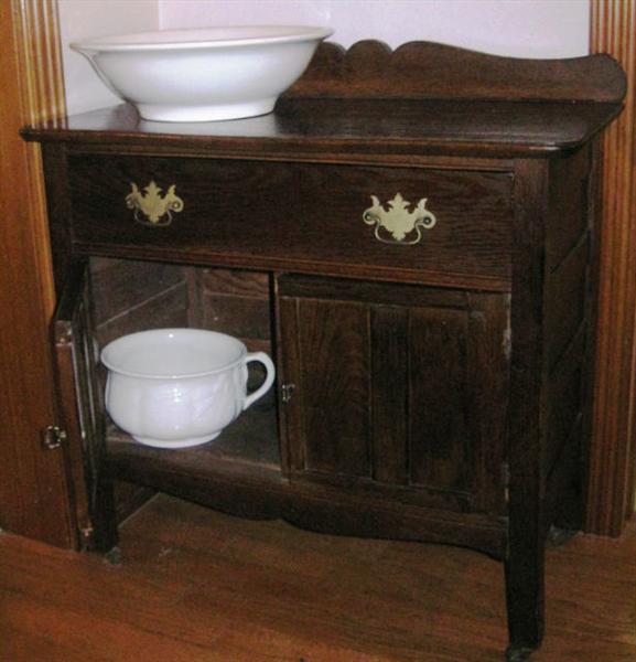 Antique Oak Wash Stand with Back Splash shown with White Ironstone Wash Basin and Chamber Pot